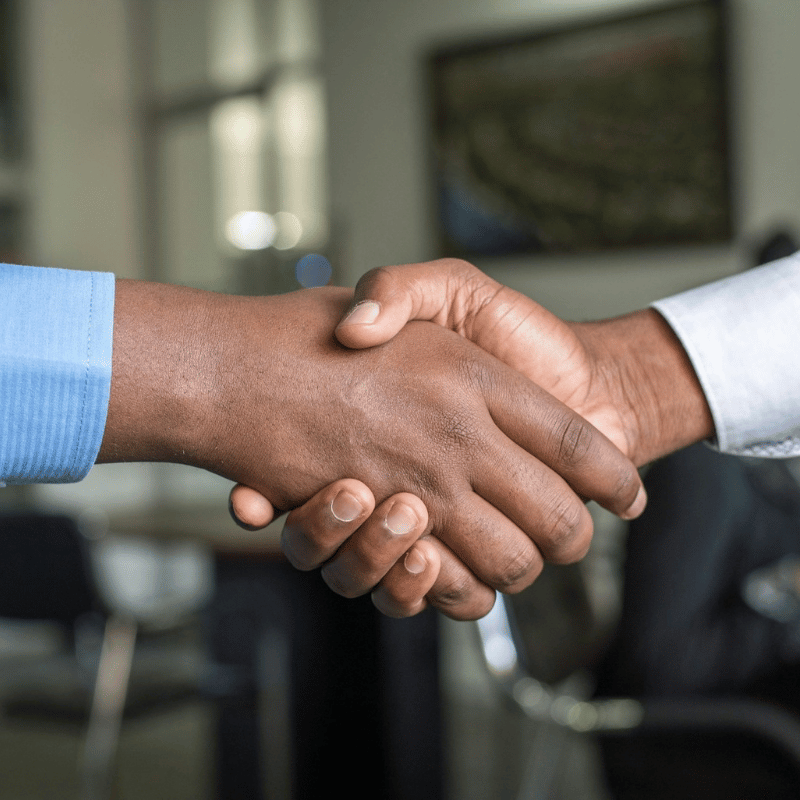 An up-close image of a handshake